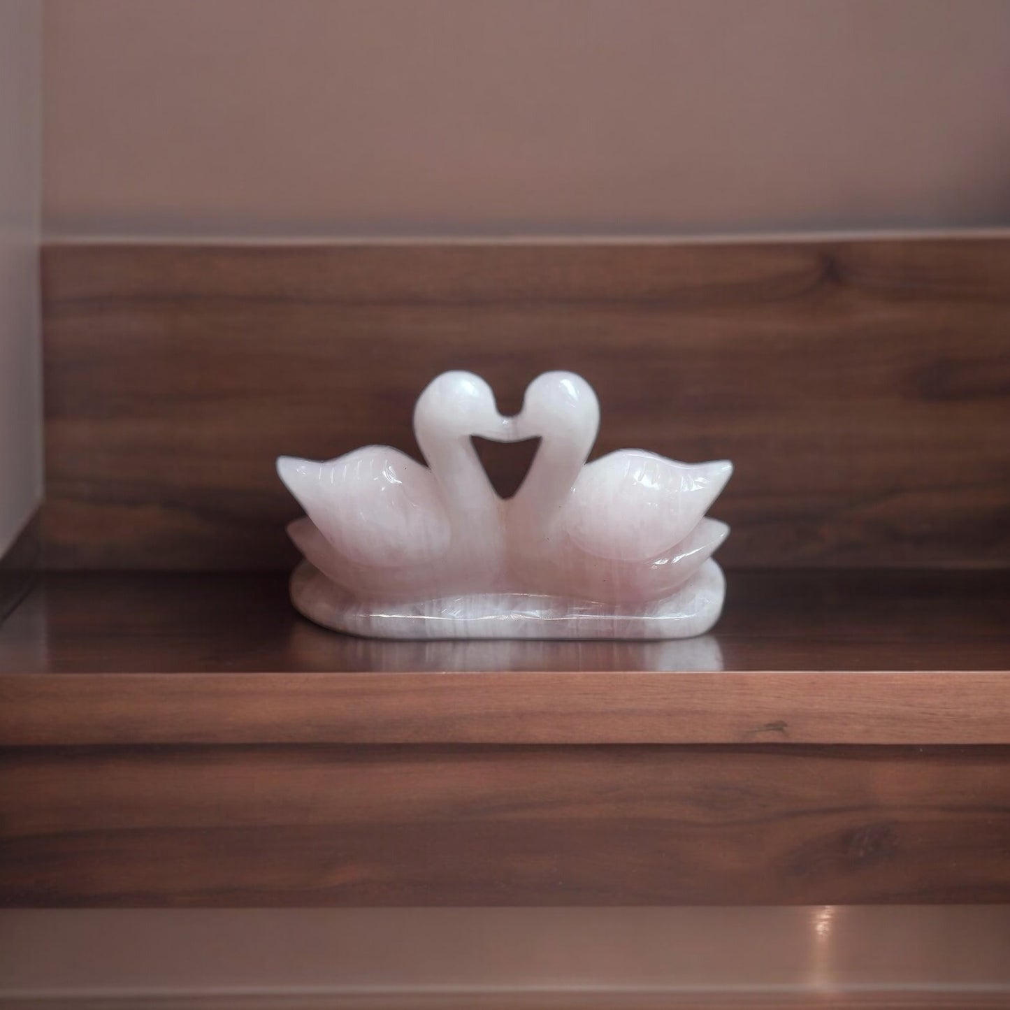 ROSE QUARTZ DUCKS: A SYMBOLIC HARMONY